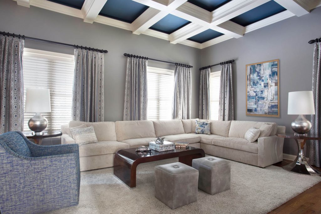 Living room with exciting ceiling details.