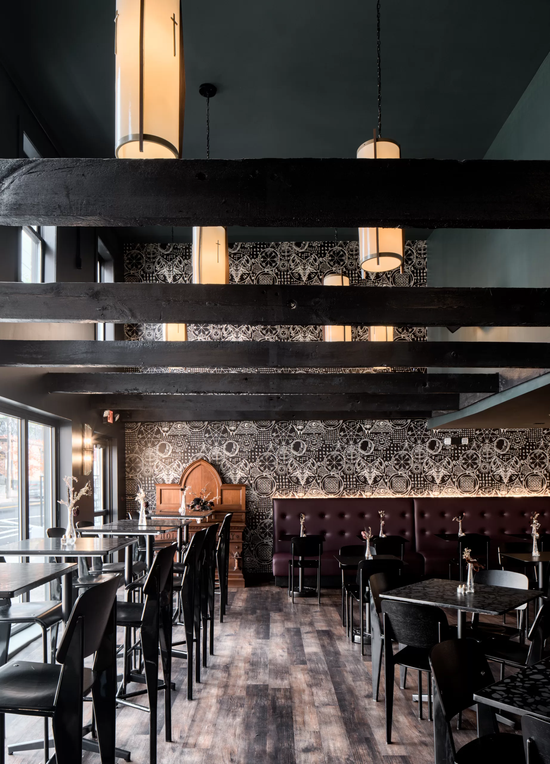 Tall ceilings and large windows enhance the seating area