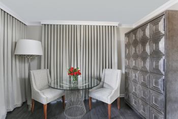 The stunning sliver piece on the right folds open to become a spacious desk! Photo by Justin Tearney.