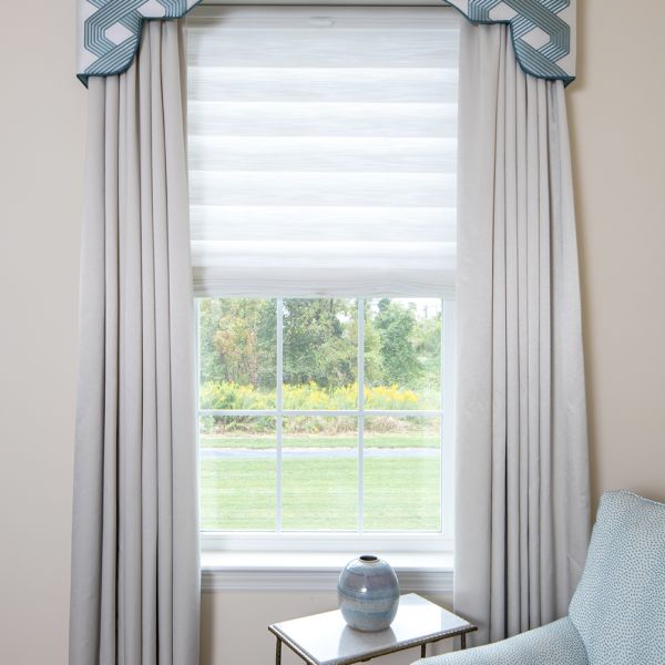 reading nook, custom window treatments, light blue armchair